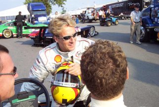 Riding the cart up to the grid with Frank Beila and Tom Kristensen- P.Mason Photo